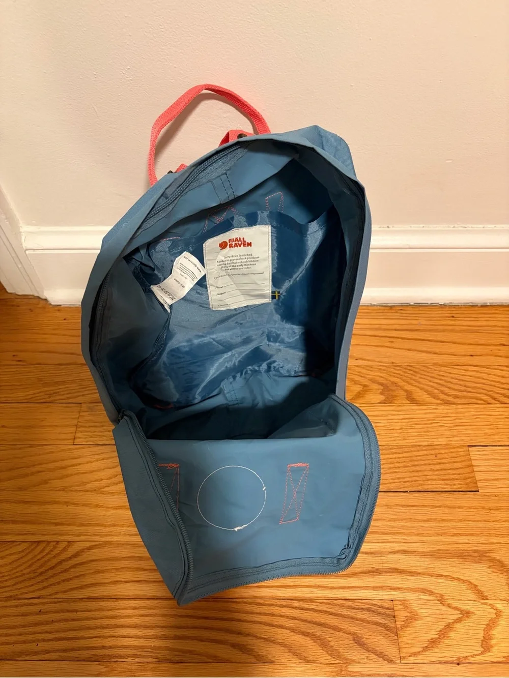 Fjallraven Kånken Blue Backpack with Coral Handles